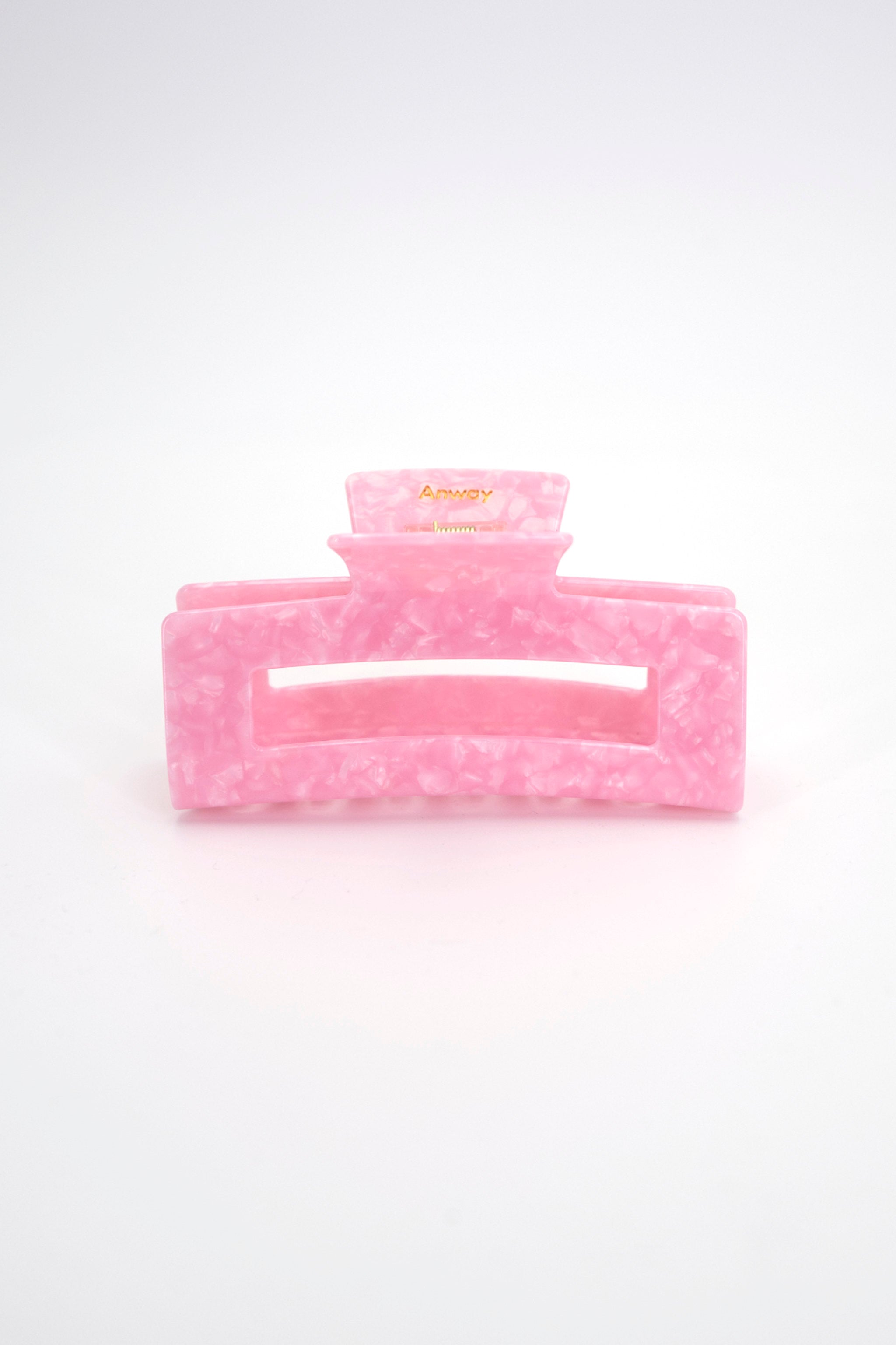 Stilvolle Haarklammer in modernem Soft Pink mit marmorierter Struktur aus robustem und leichtem Material – modisches Haaraccessoire mit sicherem Halt und angenehmem Tragegefühl, ideal für den Alltag und besondere Anlässe.