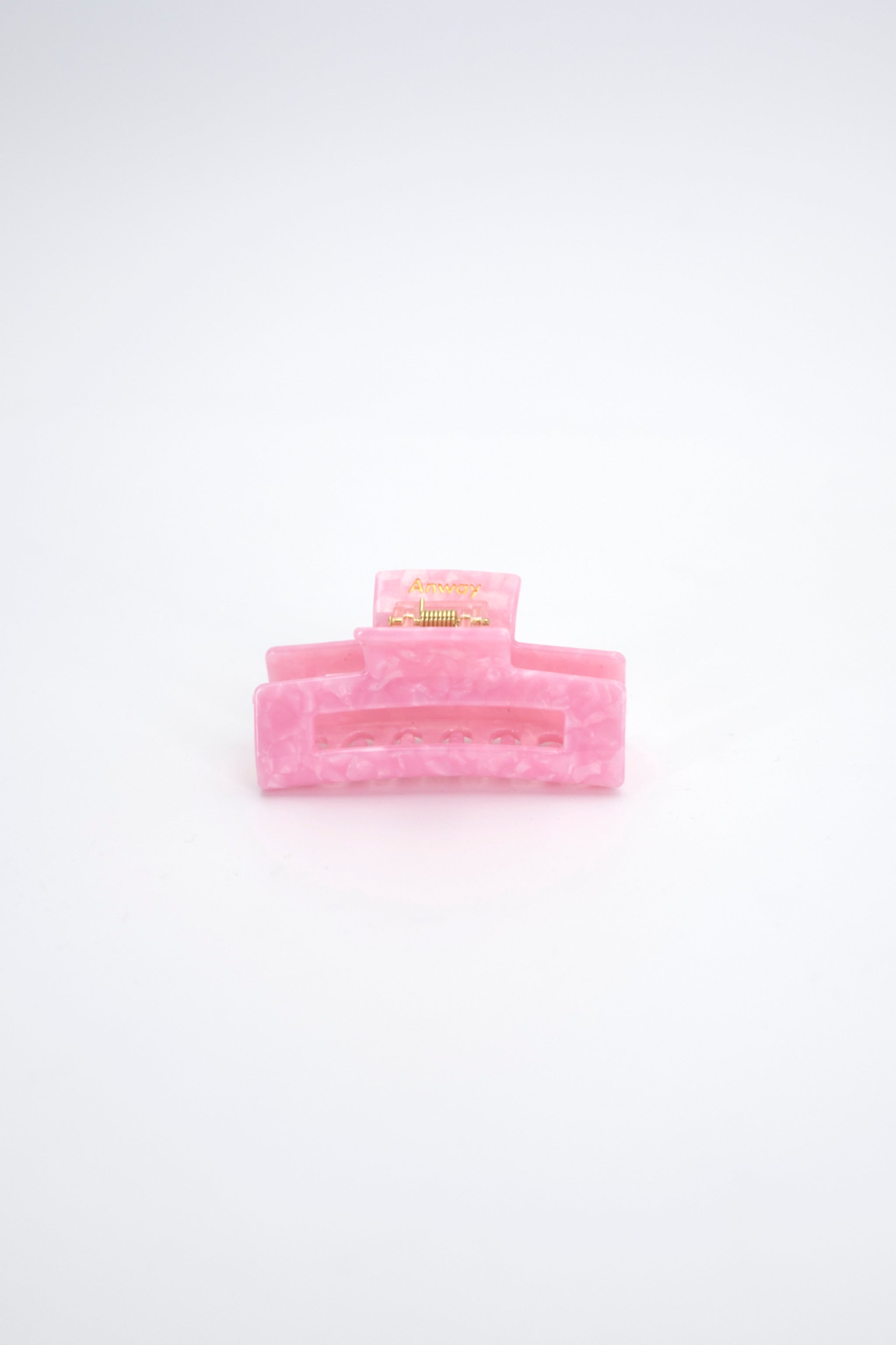 Stilvolle Haarklammer in modernem Soft Pink mit marmorierter Struktur aus robustem und leichtem Material – modisches Haaraccessoire mit sicherem Halt und angenehmem Tragegefühl, ideal für den Alltag und besondere Anlässe.