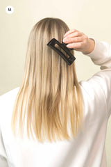 Stilvolle Haarklammer in schwarz aus robustem und leichtem Material – modisches Haaraccessoire mit sicherem Halt und angenehmem Tragegefühl, ideal für den Alltag und besondere Anlässe.