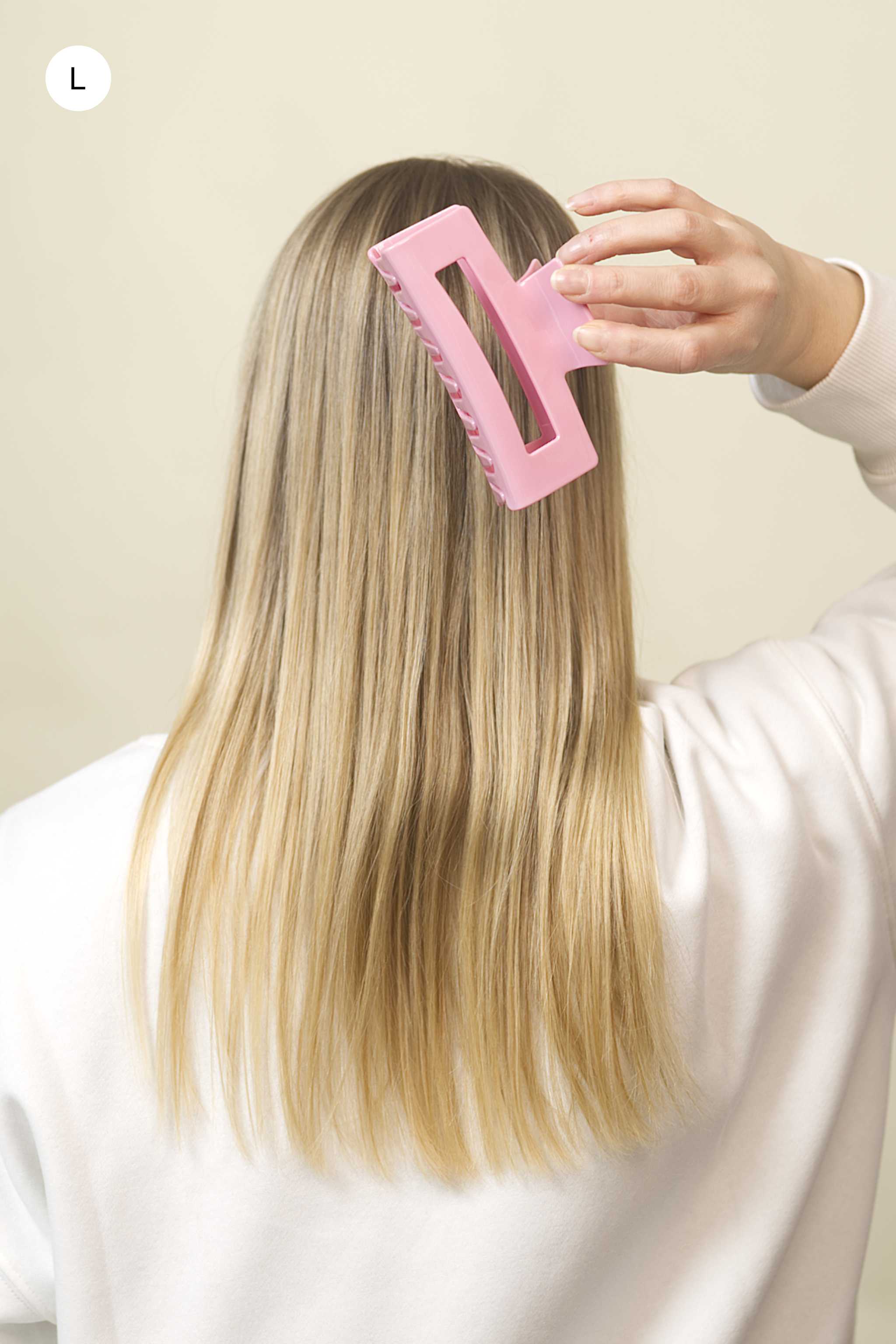 Stilvolle Haarklammer in rosa aus robustem und leichtem Material – modisches Haaraccessoire mit sicherem Halt und angenehmem Tragegefühl, ideal für den Alltag und besondere Anlässe.