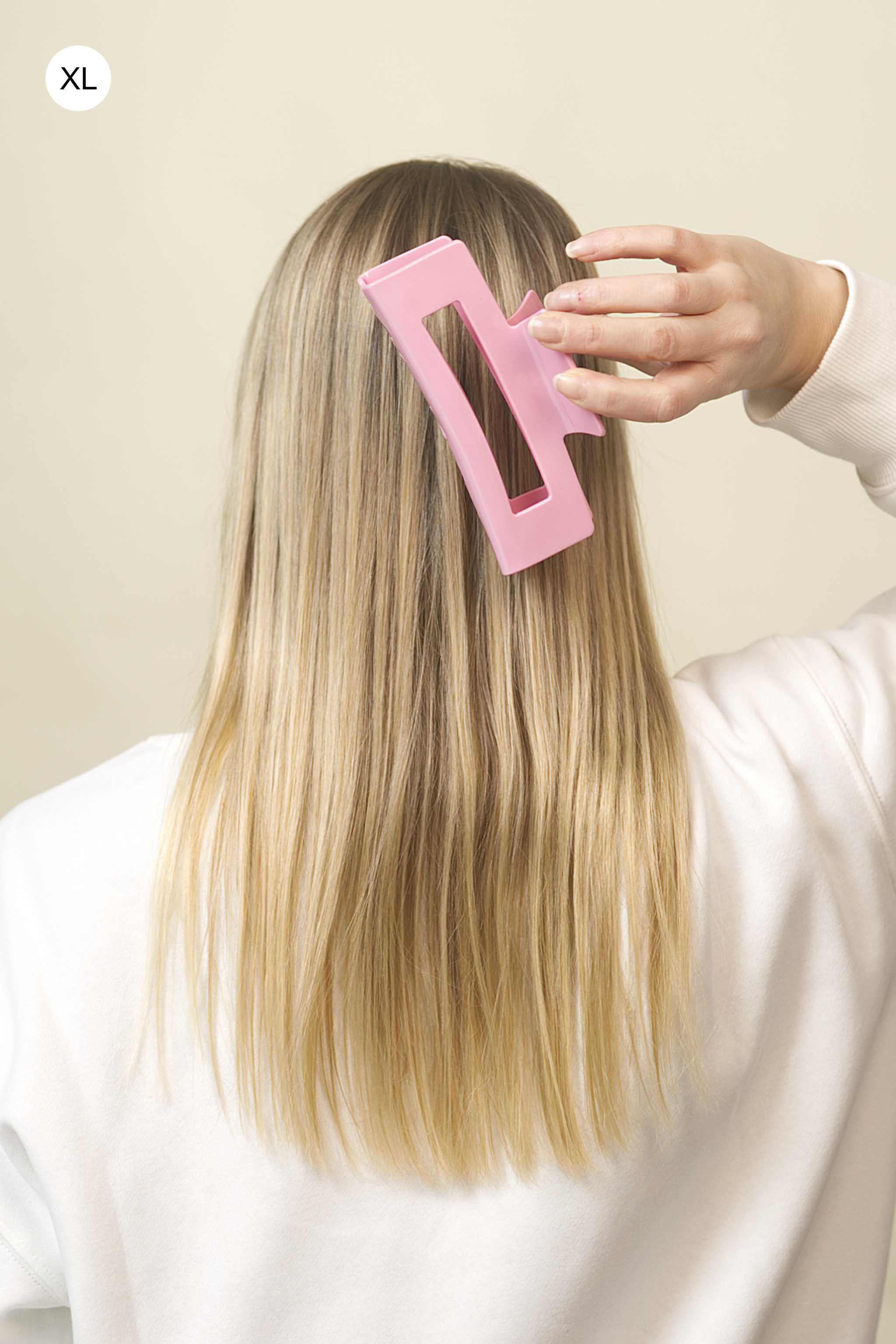 Stilvolle Haarklammer in rosa aus robustem und leichtem Material – modisches Haaraccessoire mit sicherem Halt und angenehmem Tragegefühl, ideal für den Alltag und besondere Anlässe.