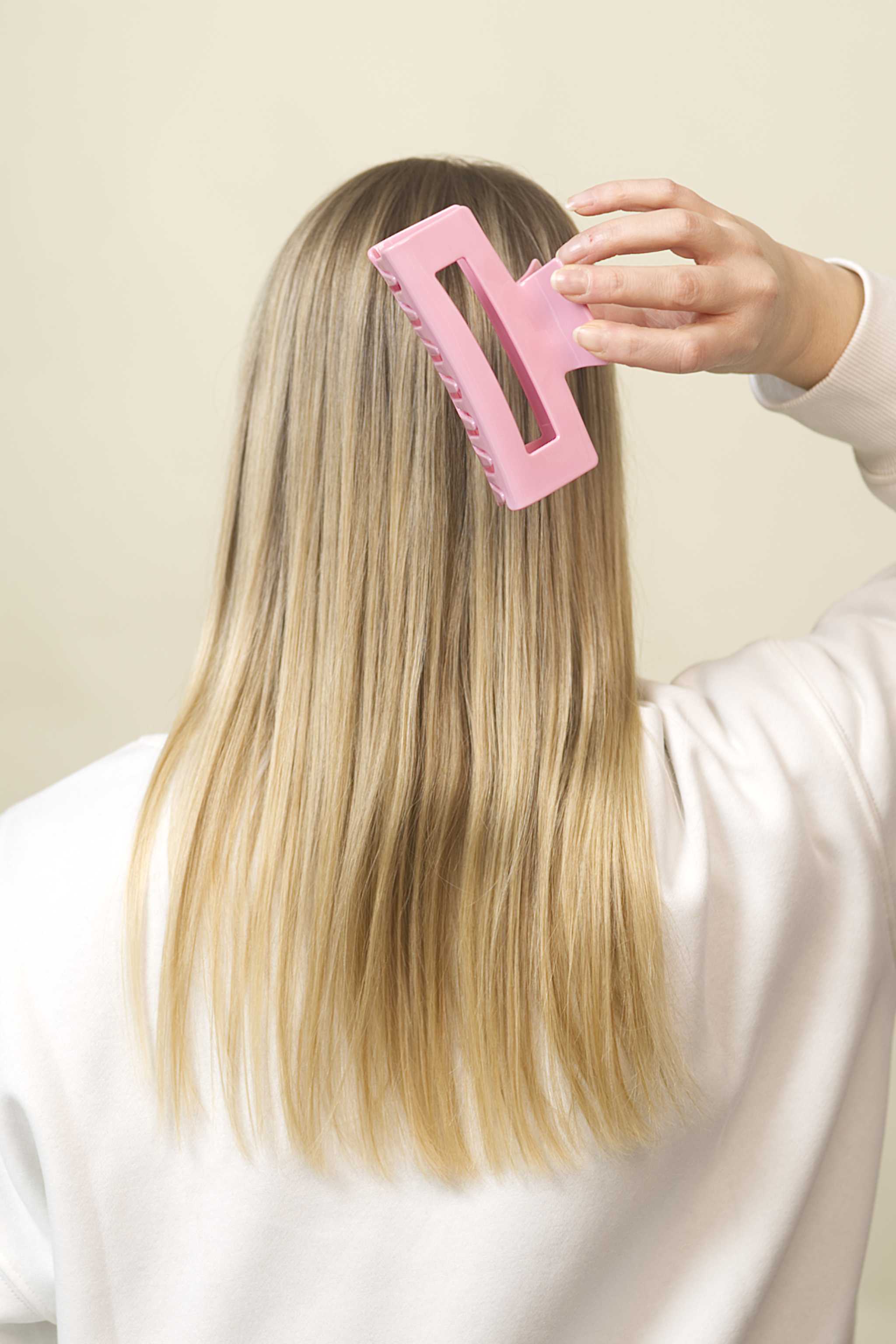 Stilvolle Haarklammer in rosa aus robustem und leichtem Material – modisches Haaraccessoire mit sicherem Halt und angenehmem Tragegefühl, ideal für den Alltag und besondere Anlässe.