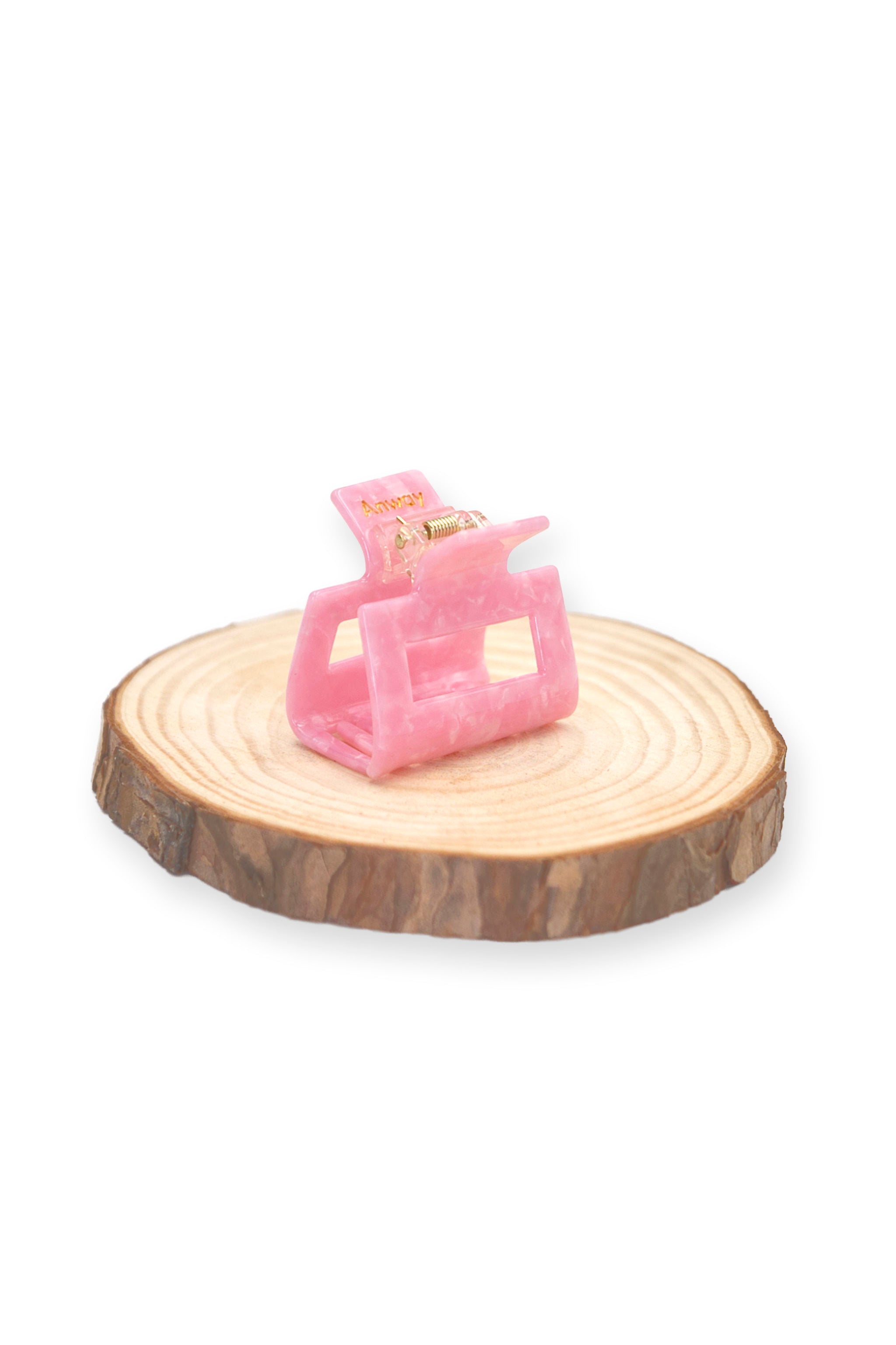 Kompakte Square Haarklammer in modernem Soft Pink mit marmorierter Struktur und elegantem Design – stilvolles, langlebiges und praktisches Haaraccessoire für unterwegs, das idealen Halt und maximalen Komfort bietet.