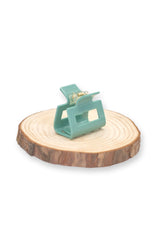 Kompakte Square Haarklammer in pastellgrün mit elegantem Design – stilvolles, langlebiges und praktisches Haaraccessoire für unterwegs, das idealen Halt und maximalen Komfort bietet.