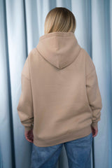 DARK BEIGE Unisex Hoodie mit moderner, oversized Passform – kuschlig weich und aus hochwertigem Material.