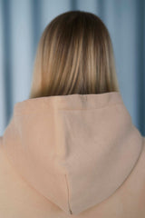 DARK BEIGE Unisex Hoodie mit moderner, oversized Passform – kuschlig weich und aus hochwertigem Material.