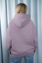 DUSTY LAVENDER Unisex Hoodie mit moderner, oversized Passform – kuschlig weich und aus hochwertigem Material.