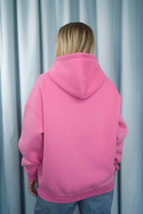 FRENCH FUCHSIA Unisex Hoodie mit moderner, oversized Passform – kuschlig weich und aus hochwertigem Material.