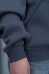 SLATE BLUE Unisex Hoodie mit moderner, oversized Passform – kuschlig weich und aus hochwertigem Material.