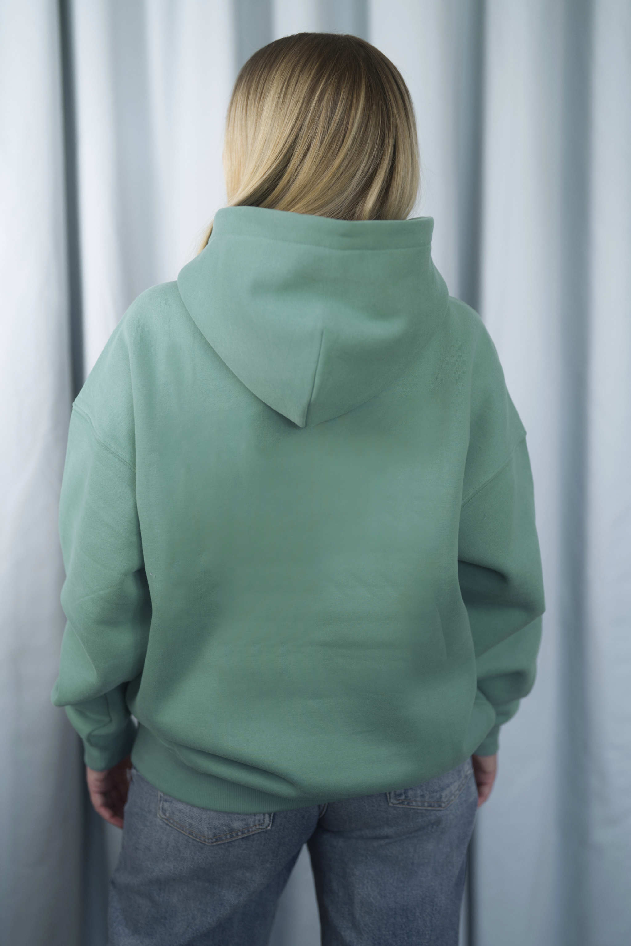 TURQUOISE GREEN Unisex Hoodie mit moderner, oversized Passform – kuschlig weich und aus hochwertigem Material.