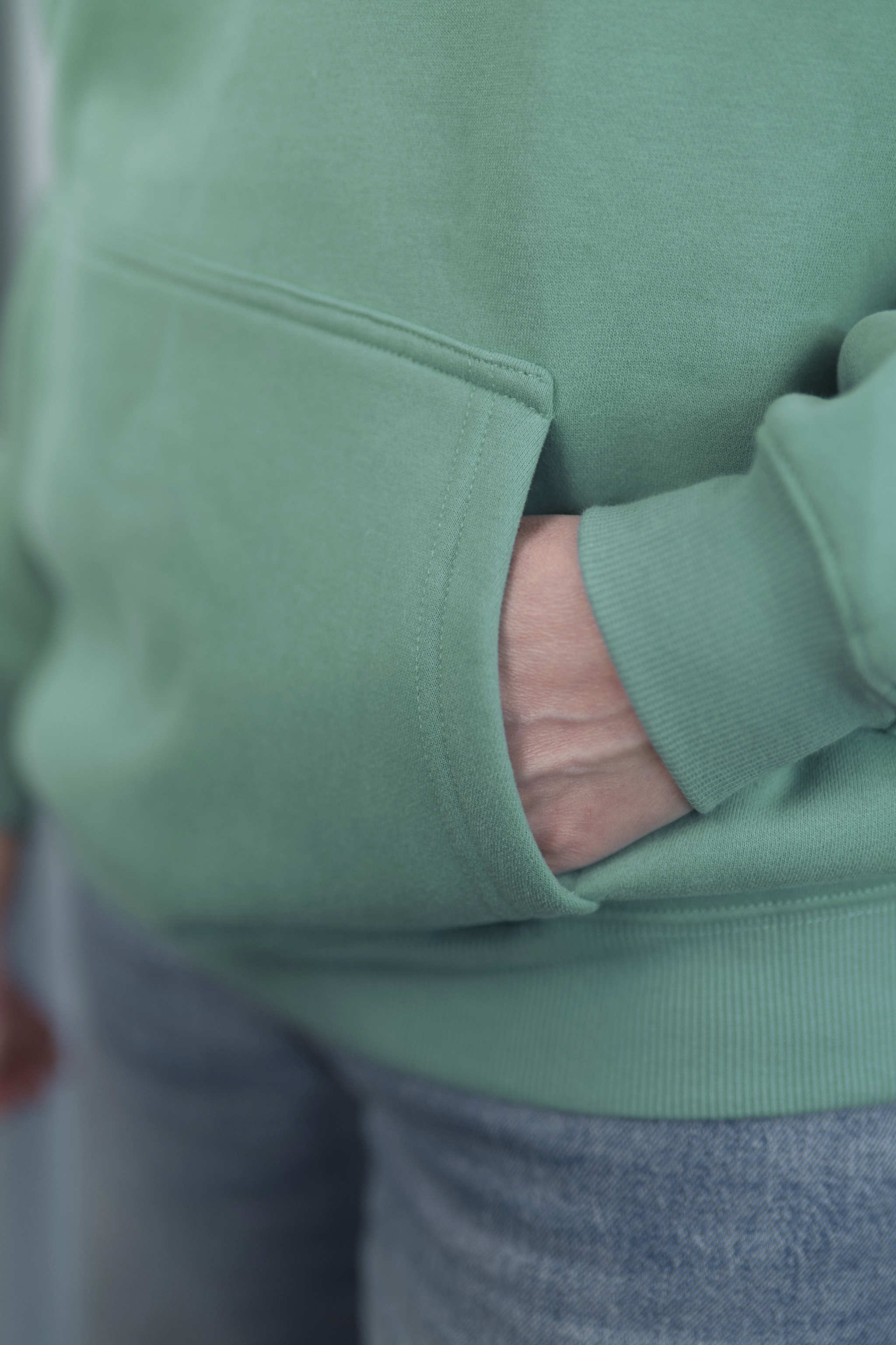 TURQUOISE GREEN Unisex Hoodie mit moderner, oversized Passform – kuschlig weich und aus hochwertigem Material.