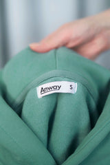 TURQUOISE GREEN Unisex Hoodie mit moderner, oversized Passform – kuschlig weich und aus hochwertigem Material.