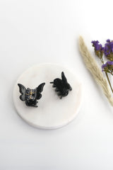 Schmetterling Mini Haarklammern in schwarz im 2er-Set – zarte Haaraccessoires zum Zurückstecken von Strähnen, ideal für verspielte Frisuren.