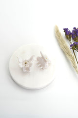 Schmetterling Mini Haarklammern in perlendem weiss im 2er-Set – zarte Haaraccessoires zum Zurückstecken von Strähnen, ideal für verspielte Frisuren.