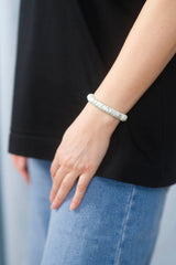 Seiden-Scrunchie in der Farbe Light Green – schonender Haargummi aus 100 % Seide für sanften Halt ohne Haarbruch.