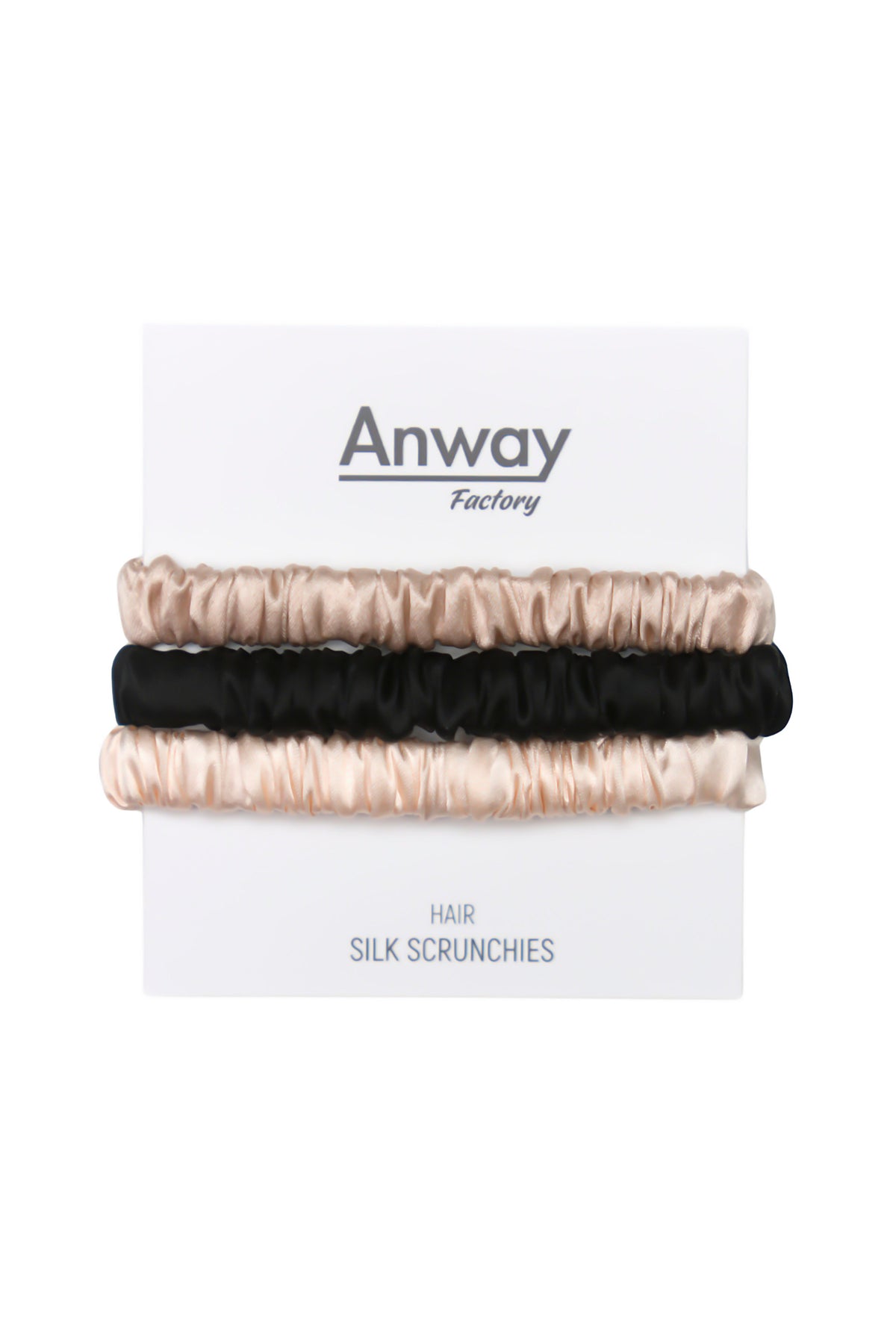3er-Set Seiden-Scrunchies in den Farben Incarnadine, Schwarz und Baby Pink – schonender Haargummi aus 100 % Seide für sanften Halt ohne Haarbruch.